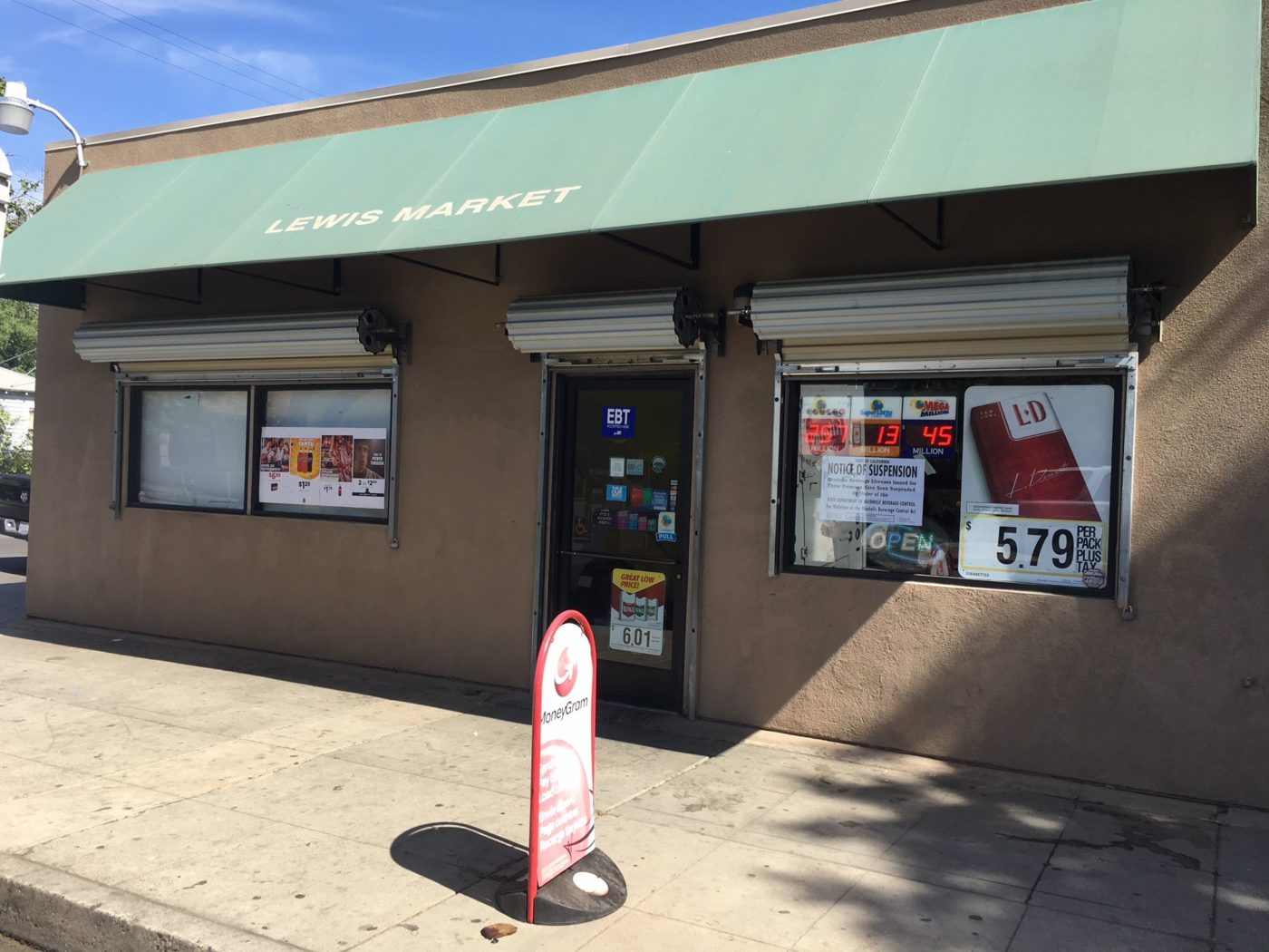 ABC Agents Post Notice of Suspension at Fresno Market California